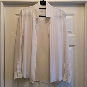 White silk blouse by equipment
